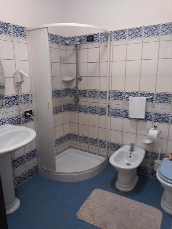 Koupelna v ubytování Hotel Sassacci