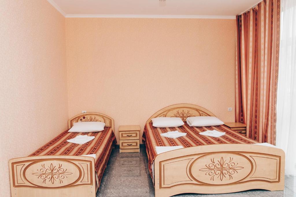 Versal 2 Guest House - Vierfachraum