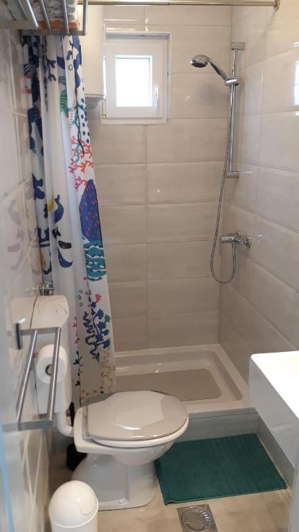 Kúpeľňa v ubytovaní Apartmani Balažić
