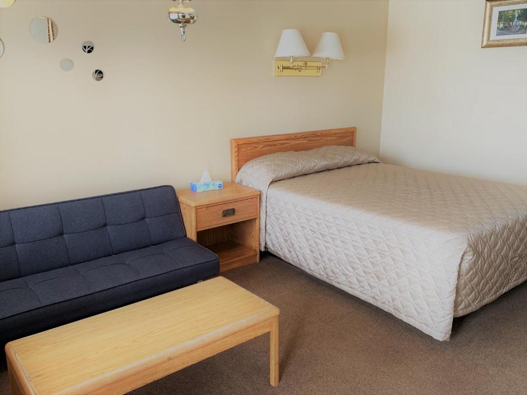 Postel nebo postele na pokoji v ubytování Hawberry Motel