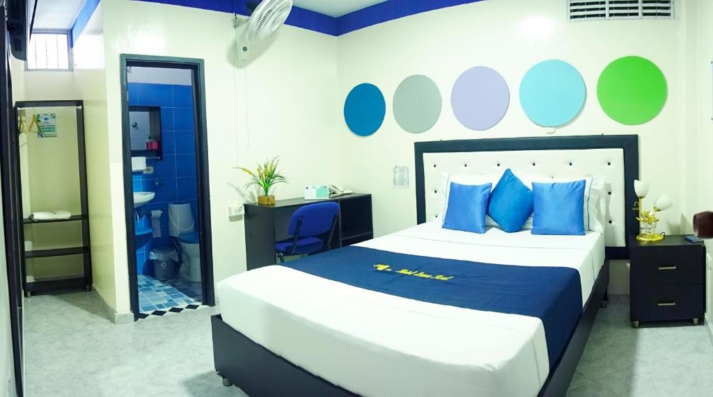 Postel nebo postele na pokoji v ubytování Hotel Luna Azul