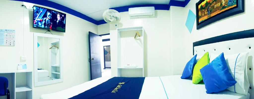 TV a/nebo společenská místnost v ubytování Hotel Luna Azul