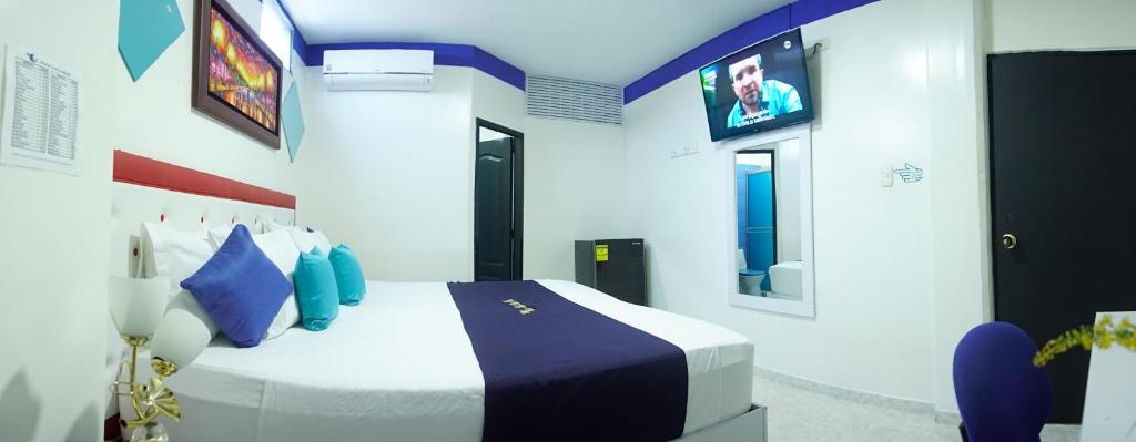 Postel nebo postele na pokoji v ubytování Hotel Luna Azul