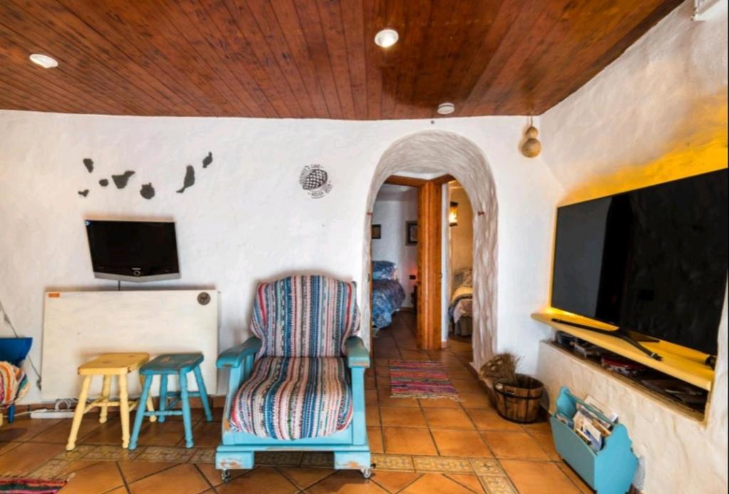 TV a/nebo společenská místnost v ubytování Silence's Cave Rural House