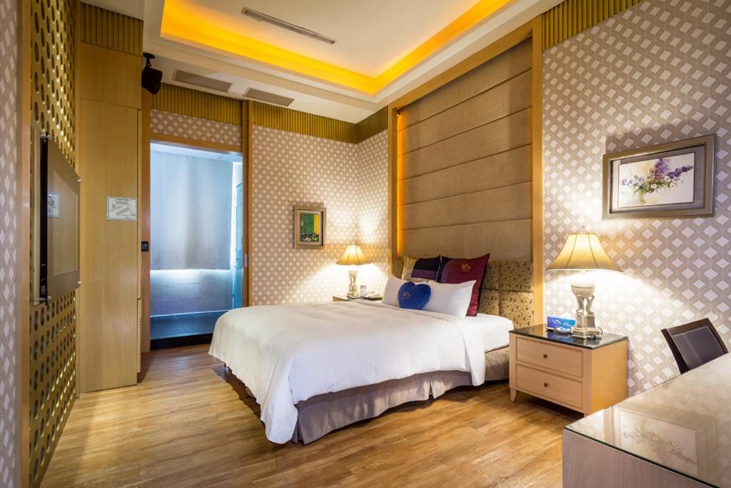 Postel nebo postele na pokoji v ubytování Blue Coast Spa Motel