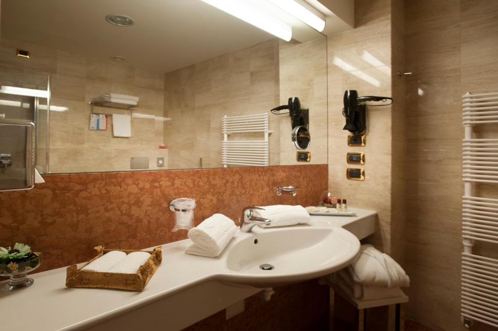 Koupelna v ubytování Hotel Calissano