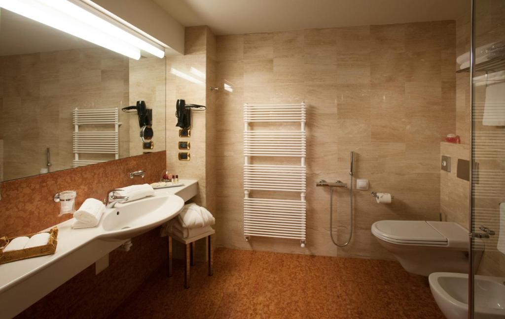 Koupelna v ubytování Hotel Calissano