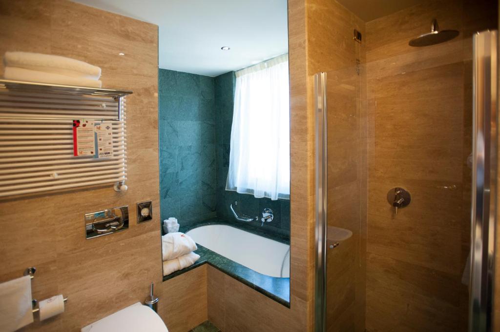 Koupelna v ubytování Hotel Calissano