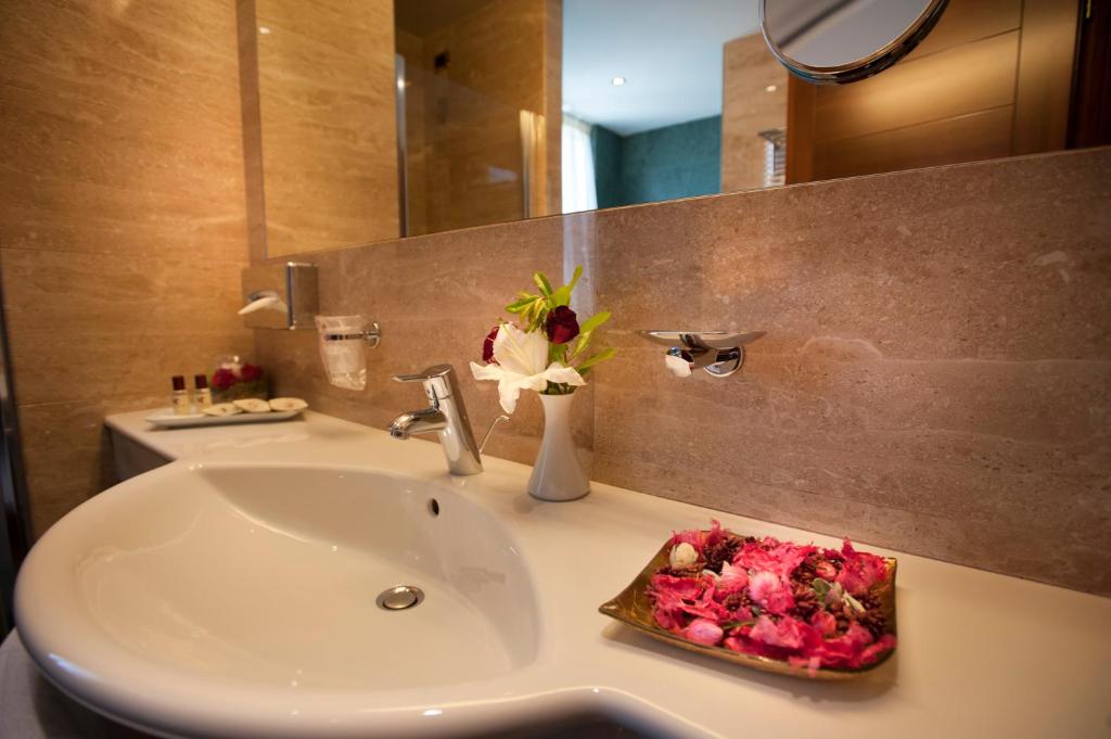 Koupelna v ubytování Hotel Calissano