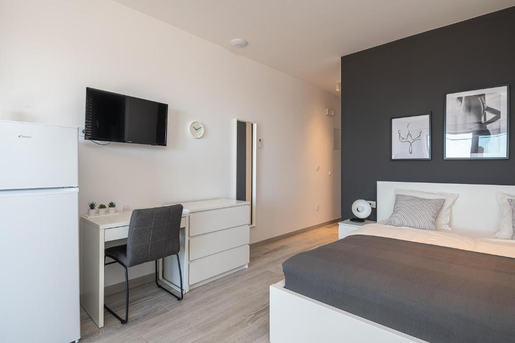 Posteľ alebo postele v izbe v ubytovaní Lemon Tree Dubrovnik Apartments