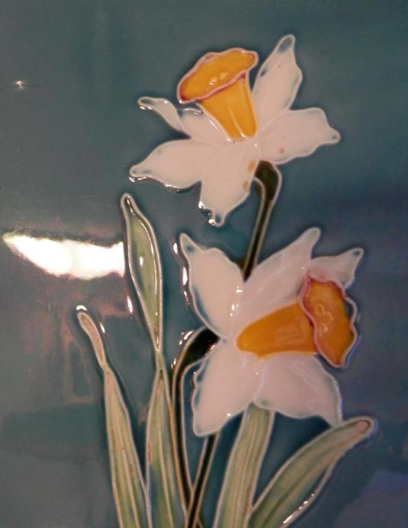 a vase with three white flowers in it at Apartment Amylee in Strehlow