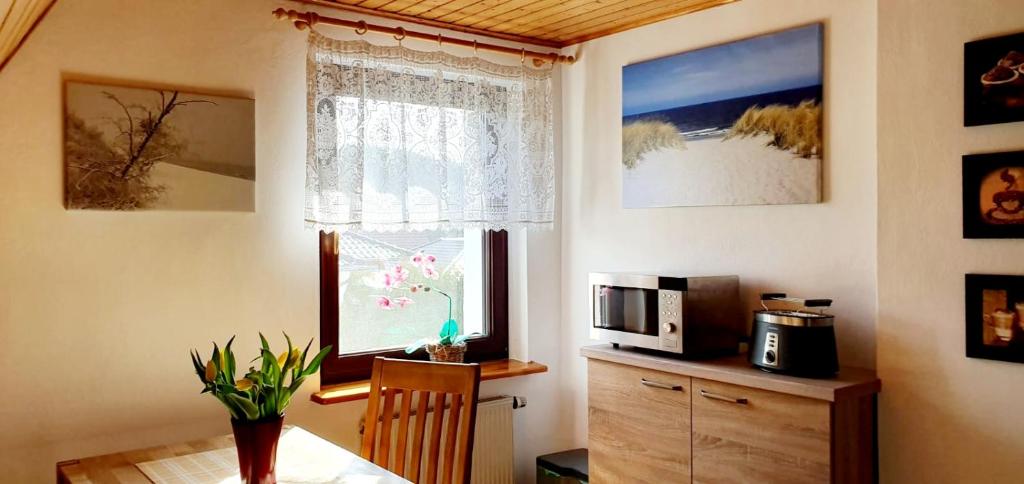 Příslušenství pro přípravu čaje a kávy v ubytování Apartments Achterblick