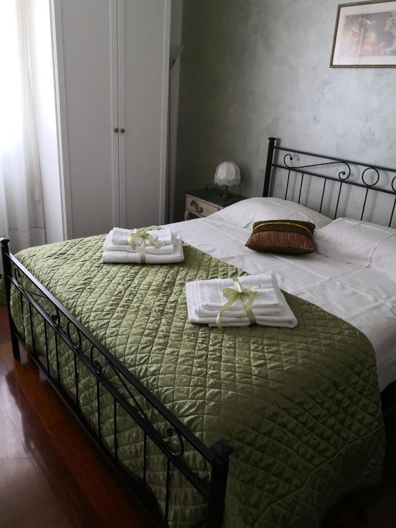 Łóżko lub łóżka w pokoju w obiekcie B&B Villa Lilla