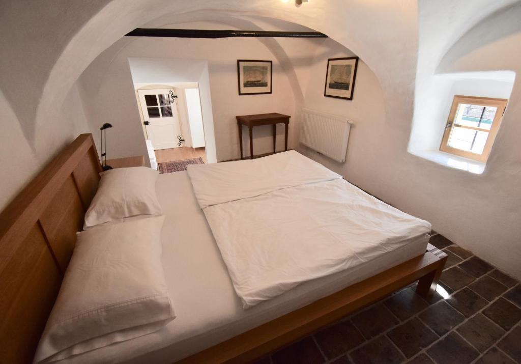 Posteľ alebo postele v izbe v ubytovaní Sammer Residenz, Breitenbrunn am Neusiedlersee