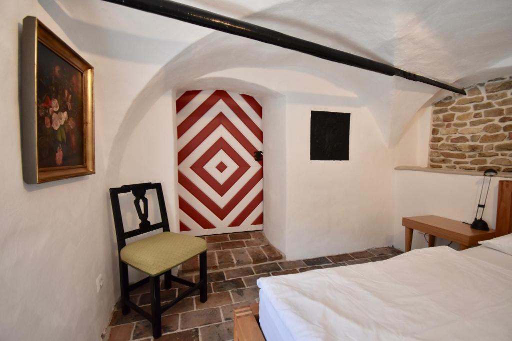 Posteľ alebo postele v izbe v ubytovaní Sammer Residenz, Breitenbrunn am Neusiedlersee