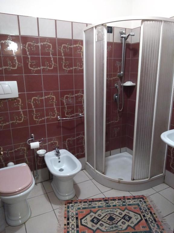 Koupelna v ubytování Hotel Sassacci