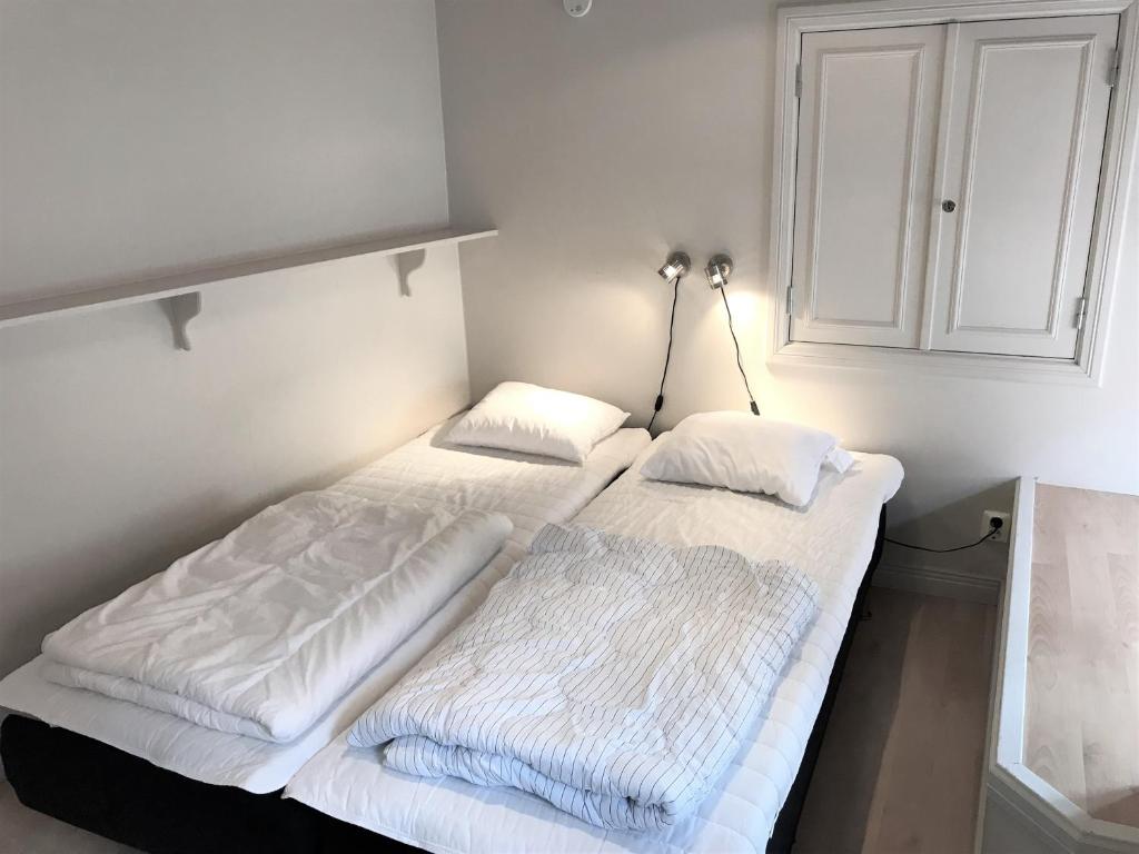 Postel nebo postele na pokoji v ubytování Fogelbergs RyG
