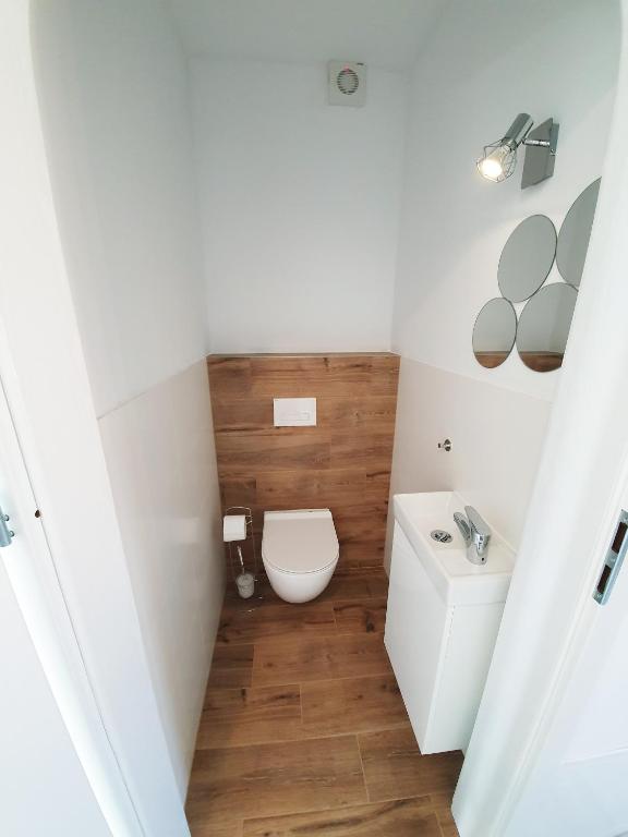 Kúpeľňa v ubytovaní Domek pod świerkami - "Apartamenty świerkowe"