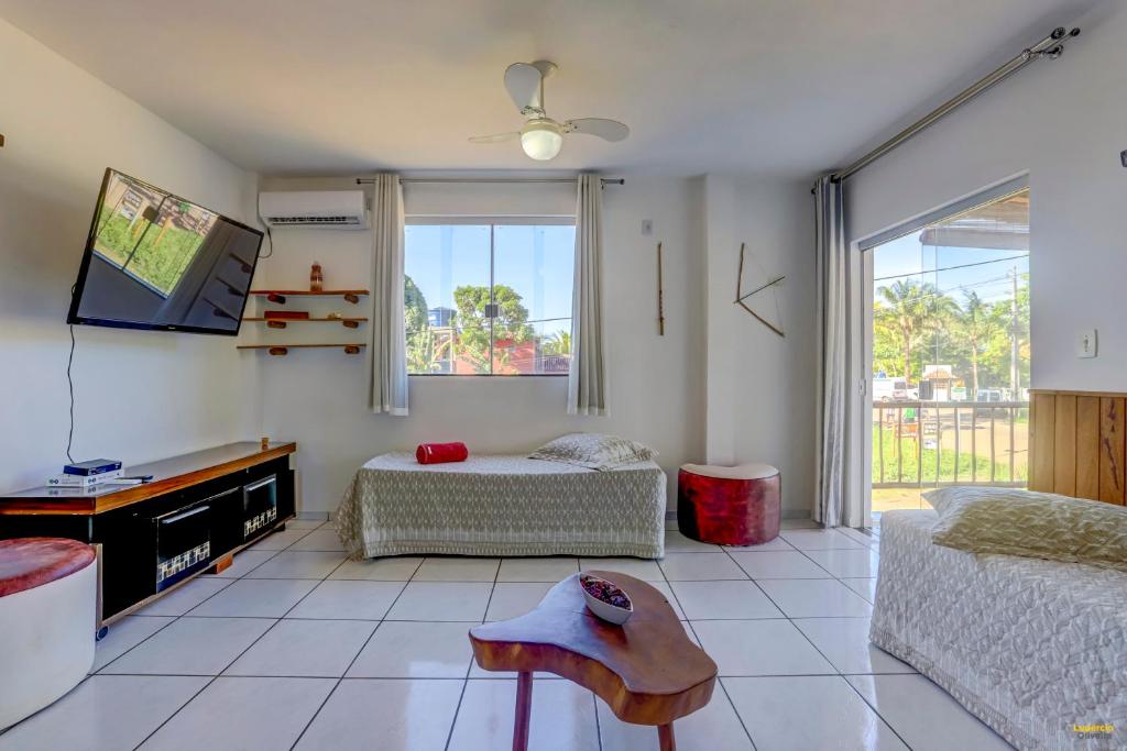 Uma área de estar em Pousada Residenzial Cariocare