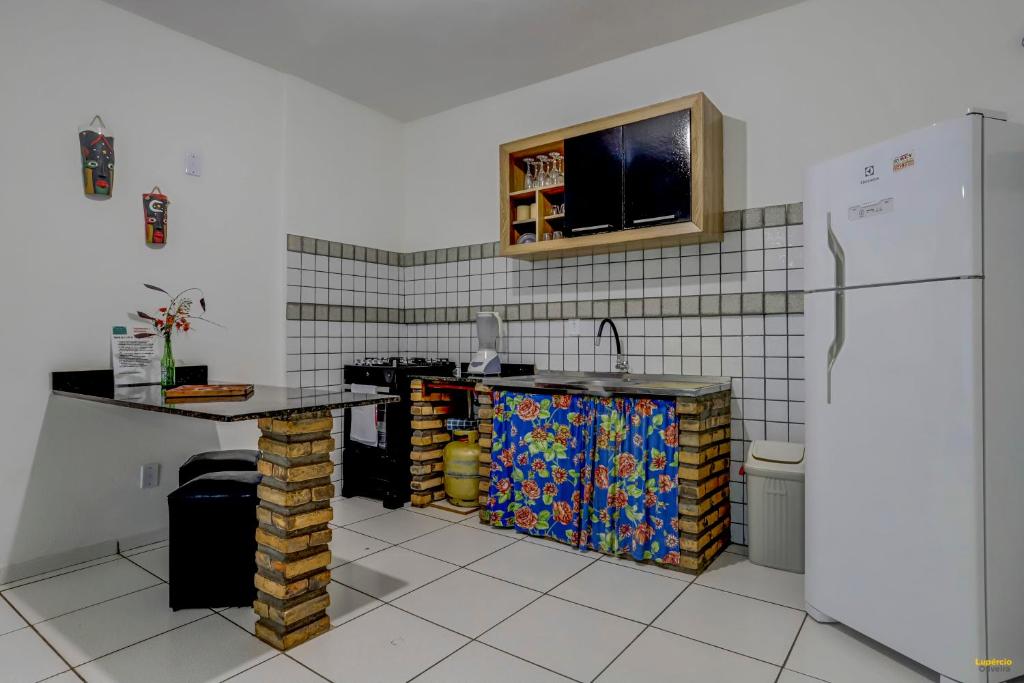 A cozinha ou cozinha compacta de Pousada Residenzial Cariocare