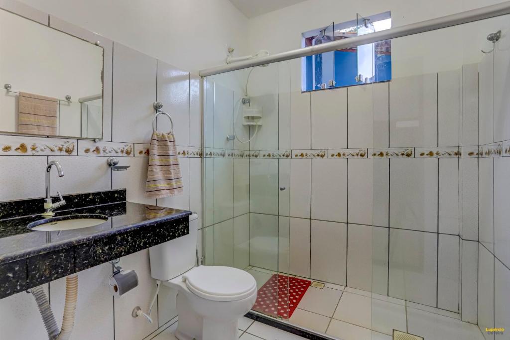 Um banheiro em Pousada Residenzial Cariocare