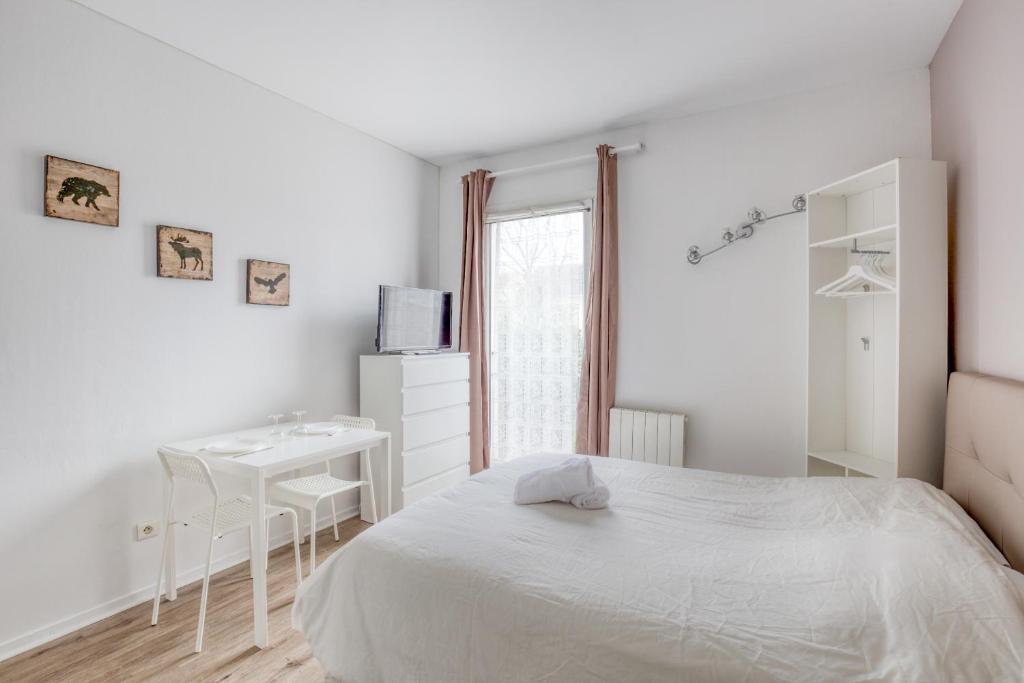 Postel nebo postele na pokoji v ubytování Le Petit Magny