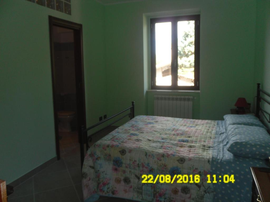 Postel nebo postele na pokoji v ubytování Bed and Breakfast Emilia