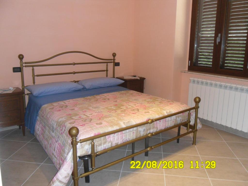 Postel nebo postele na pokoji v ubytování Bed and Breakfast Emilia