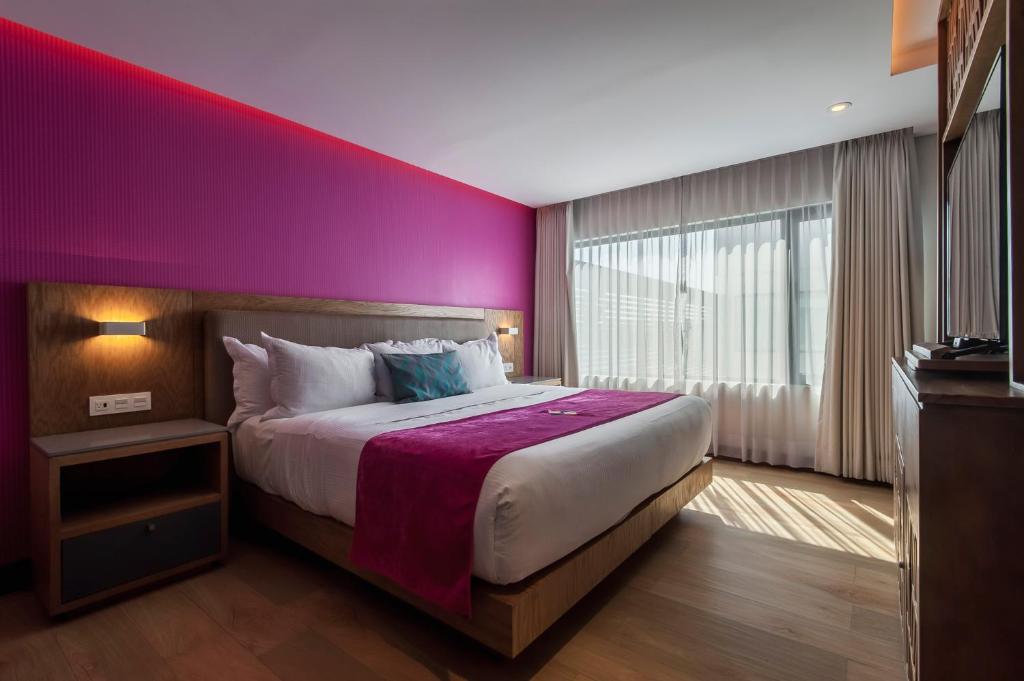 Postel nebo postele na pokoji v ubytování FCH Hotel Providencia