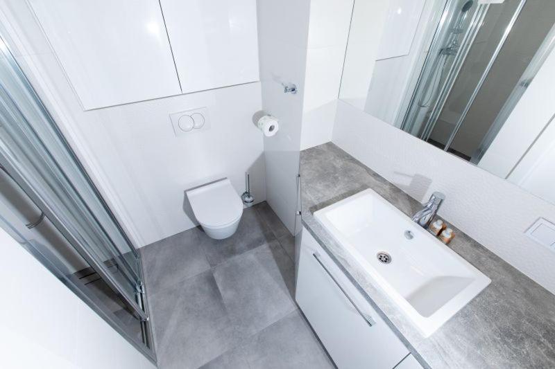 Koupelna v ubytování Resort Apartamenty Klifowa Rewal 30