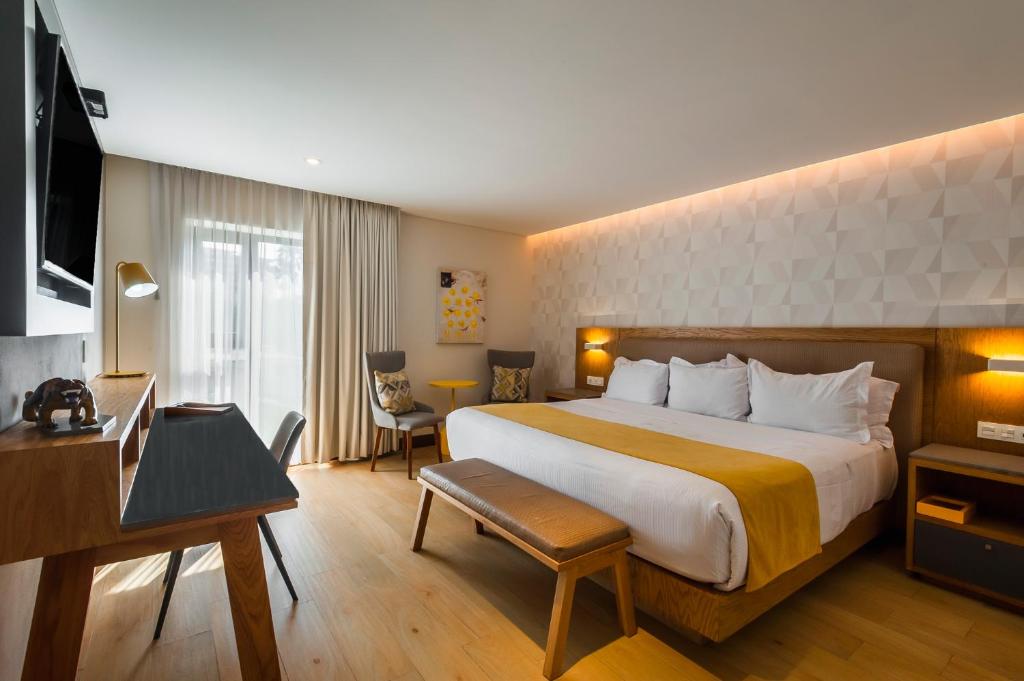 TV a/nebo společenská místnost v ubytování FCH Hotel Providencia