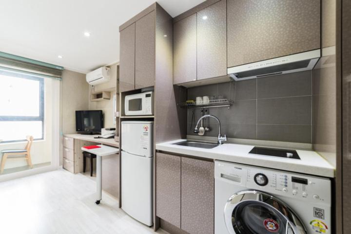 Kuchyň nebo kuchyňský kout v ubytování Residence Hotel Lamia