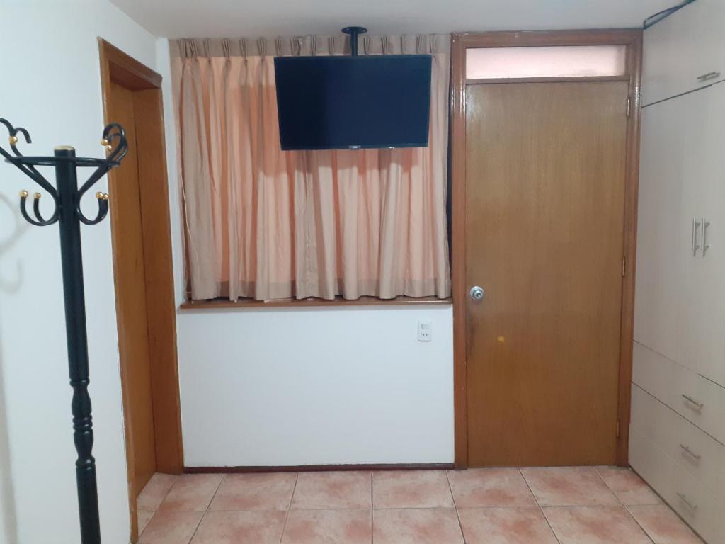 TV a/nebo společenská místnost v ubytování Inka Ayllu Hospedaje