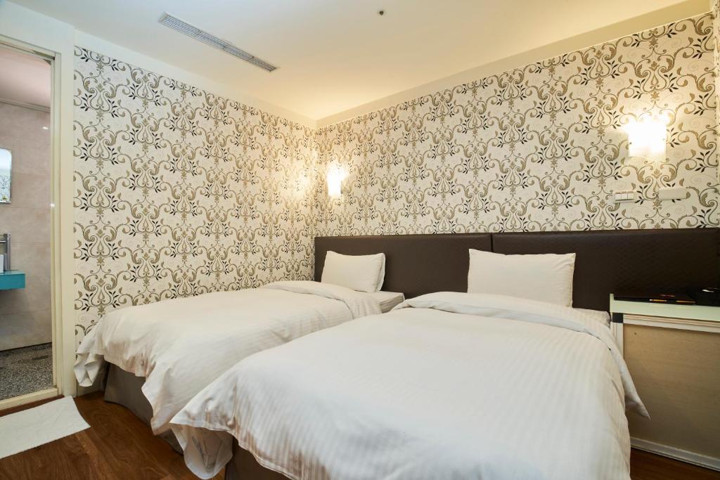 Lova arba lovos apgyvendinimo įstaigoje HengChang Business Hotel