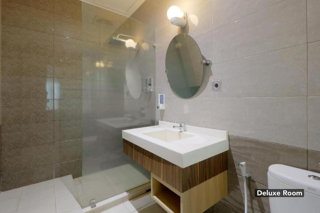 Koupelna v ubytování Mutiara Suites