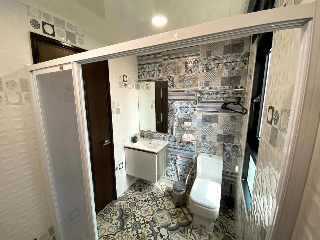 Koupelna v ubytování 奧斯卡海景民宿Oscar Boutique Seaview Homestay