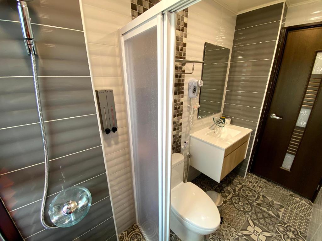 Koupelna v ubytování 奧斯卡海景民宿Oscar Boutique Seaview Homestay