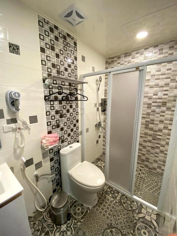 Koupelna v ubytování 奧斯卡海景民宿Oscar Boutique Seaview Homestay