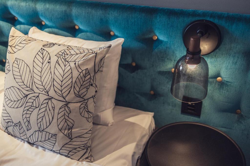 Postel nebo postele na pokoji v ubytování Hotel Poseidon