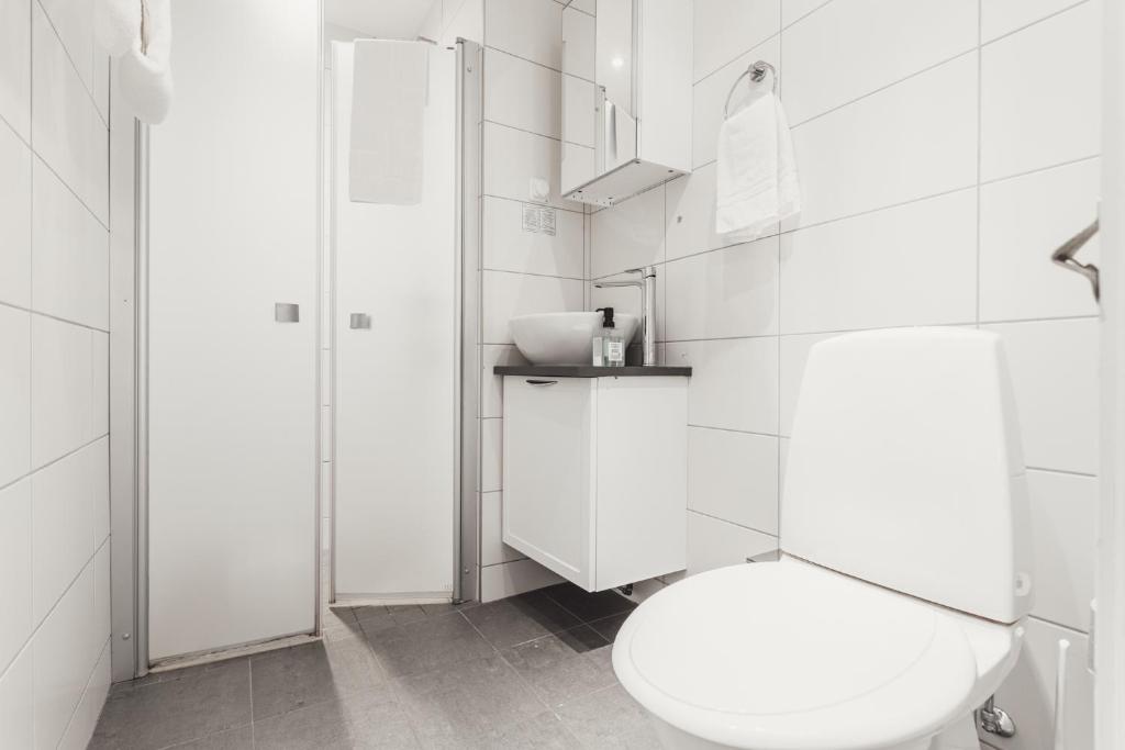 Koupelna v ubytování Hotel Poseidon