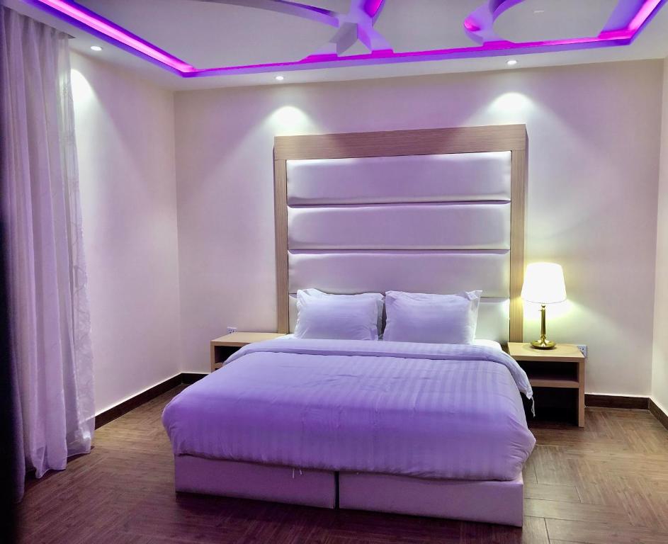 Ein Bett oder Betten in einem Zimmer der Unterkunft Rohara Resort