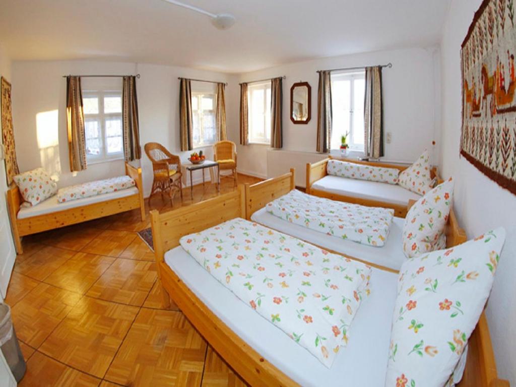 Postel nebo postele na pokoji v ubytování Ferienhaus Eulenhof