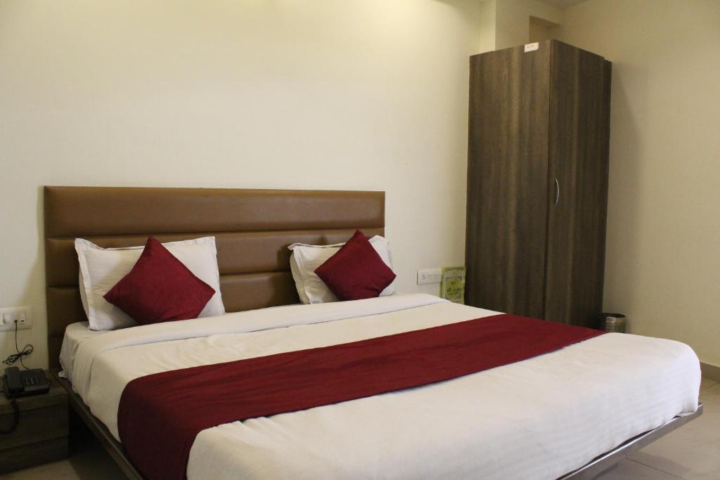 Postel nebo postele na pokoji v ubytování Hotel The SG