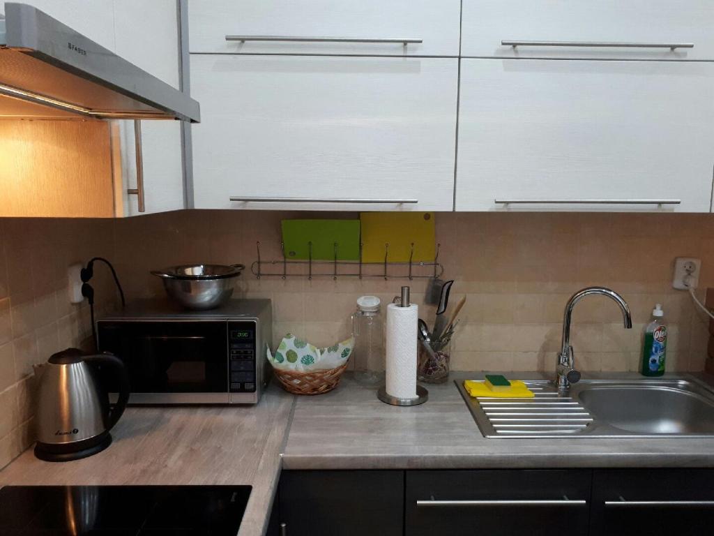 Kuchyňa alebo kuchynka v ubytovaní Apartament Twoja Przystań