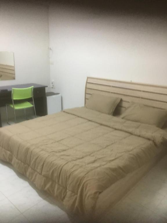 Postel nebo postele na pokoji v ubytování Baan Suan Resort2345