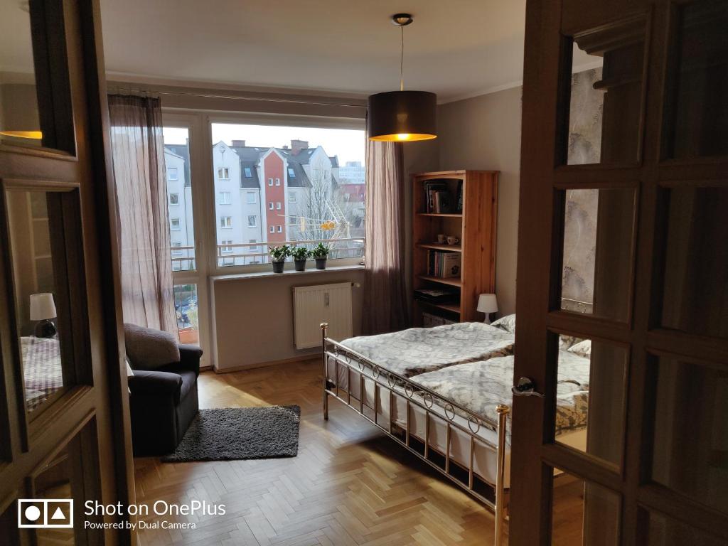 Postel nebo postele na pokoji v ubytování Apartament Park