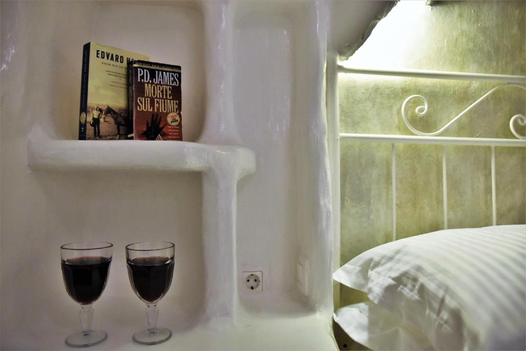 Postel nebo postele na pokoji v ubytování Adamas Hotel
