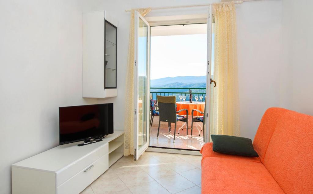 Telewizja i/lub zestaw kina domowego w obiekcie Apartments Eugen 2024