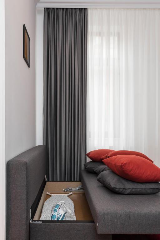 Postel nebo postele na pokoji v ubytování Martin Boutique Hotel