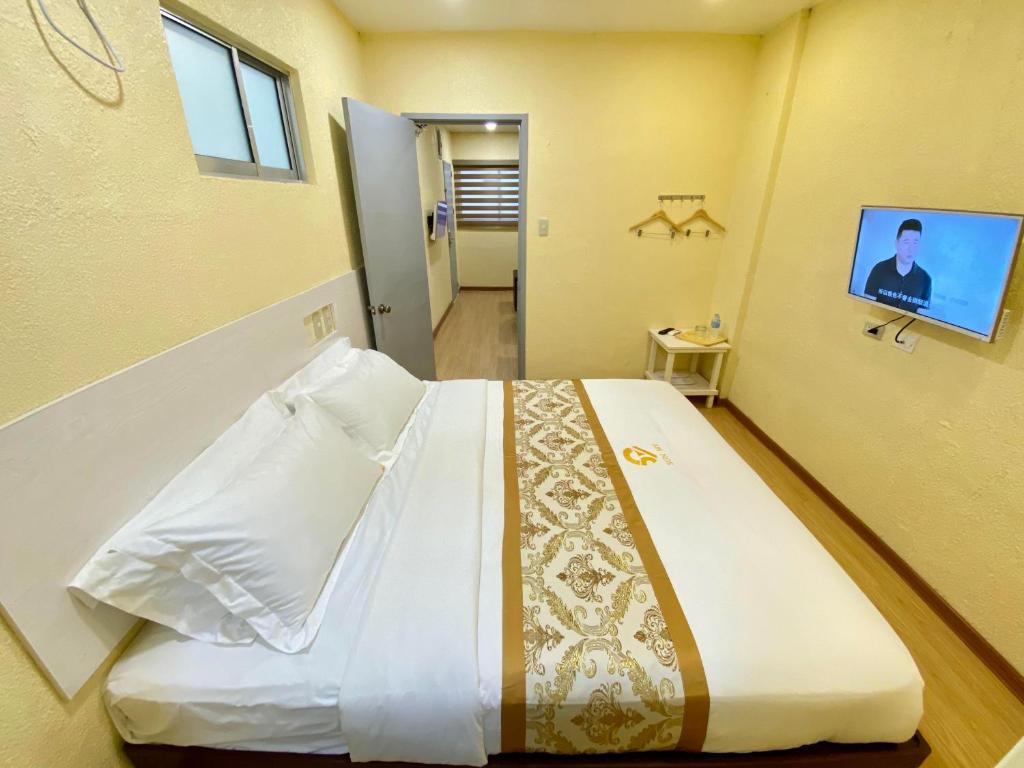 Postel nebo postele na pokoji v ubytování SUN MY HOTEL